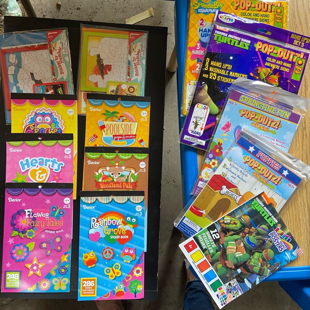 Sticker books and activity packets, never used!
